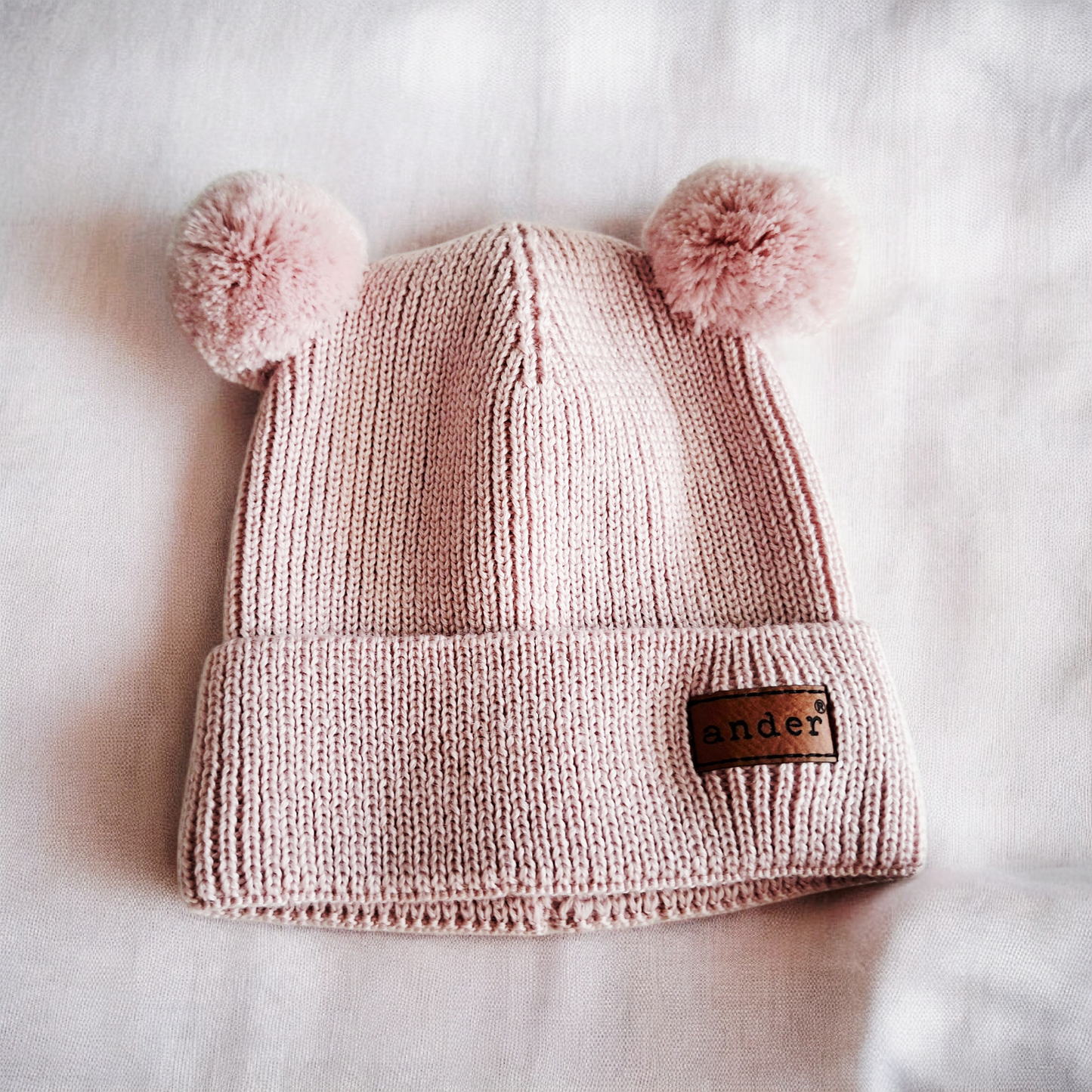 Bonnet tricoté Teddy en 100 % laine mérinos avec pompon Rose