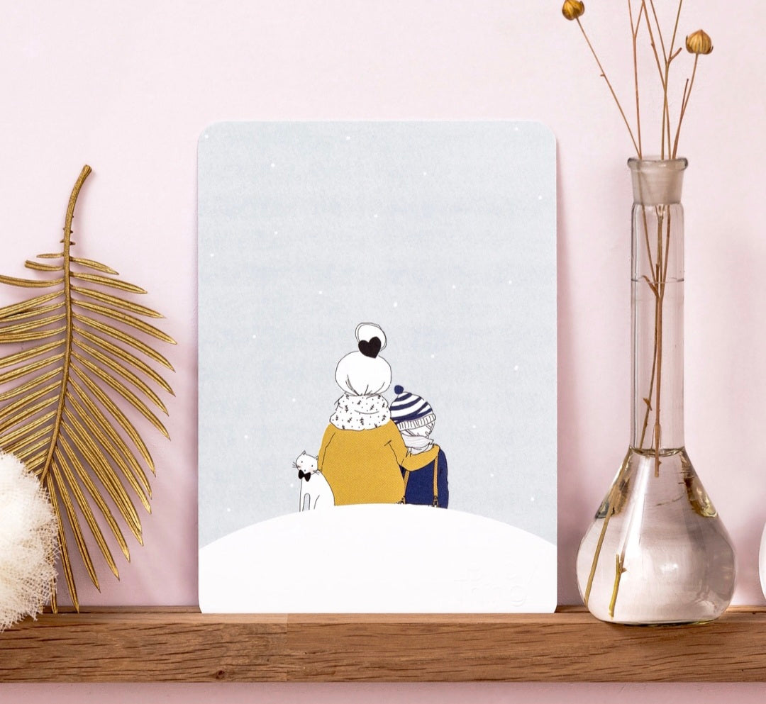 Carte sous le garçon des neiges